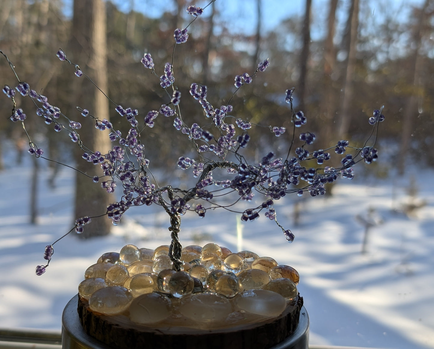 Wire tree with purple blooms
