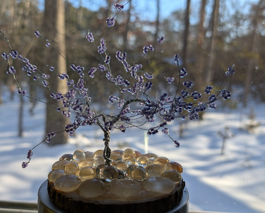 Wire tree with purple blooms